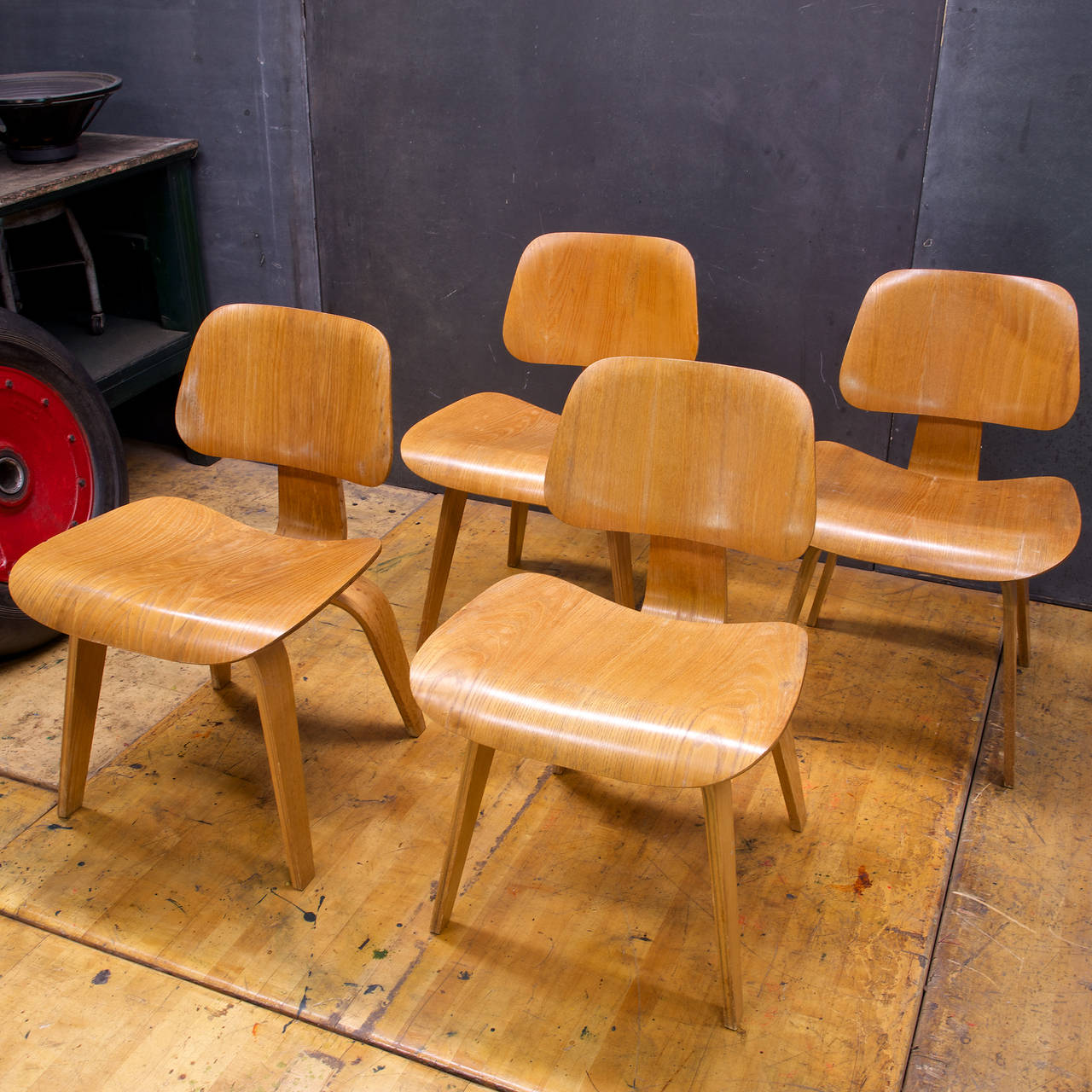 One of the first First Production runs of these Iconic Mid-Century Bentwood Chairs, with one of the Earliest Evans labels, in which all chairs retain. These DCW Chairs by Charles Eames for Herman Miller/Evans Plywood Division.  Estate Fresh,