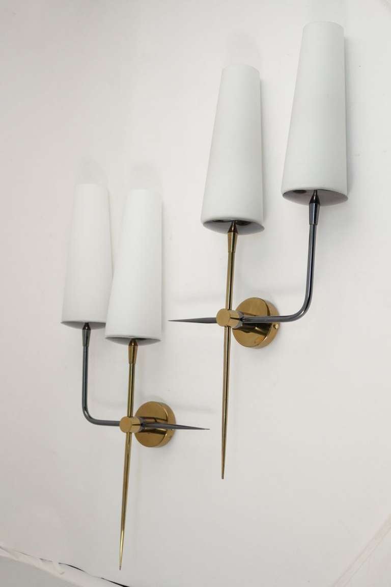 Large pair of 1950's asymmetrical double sconces Arlus Edition. Two tones patina, gilded and 