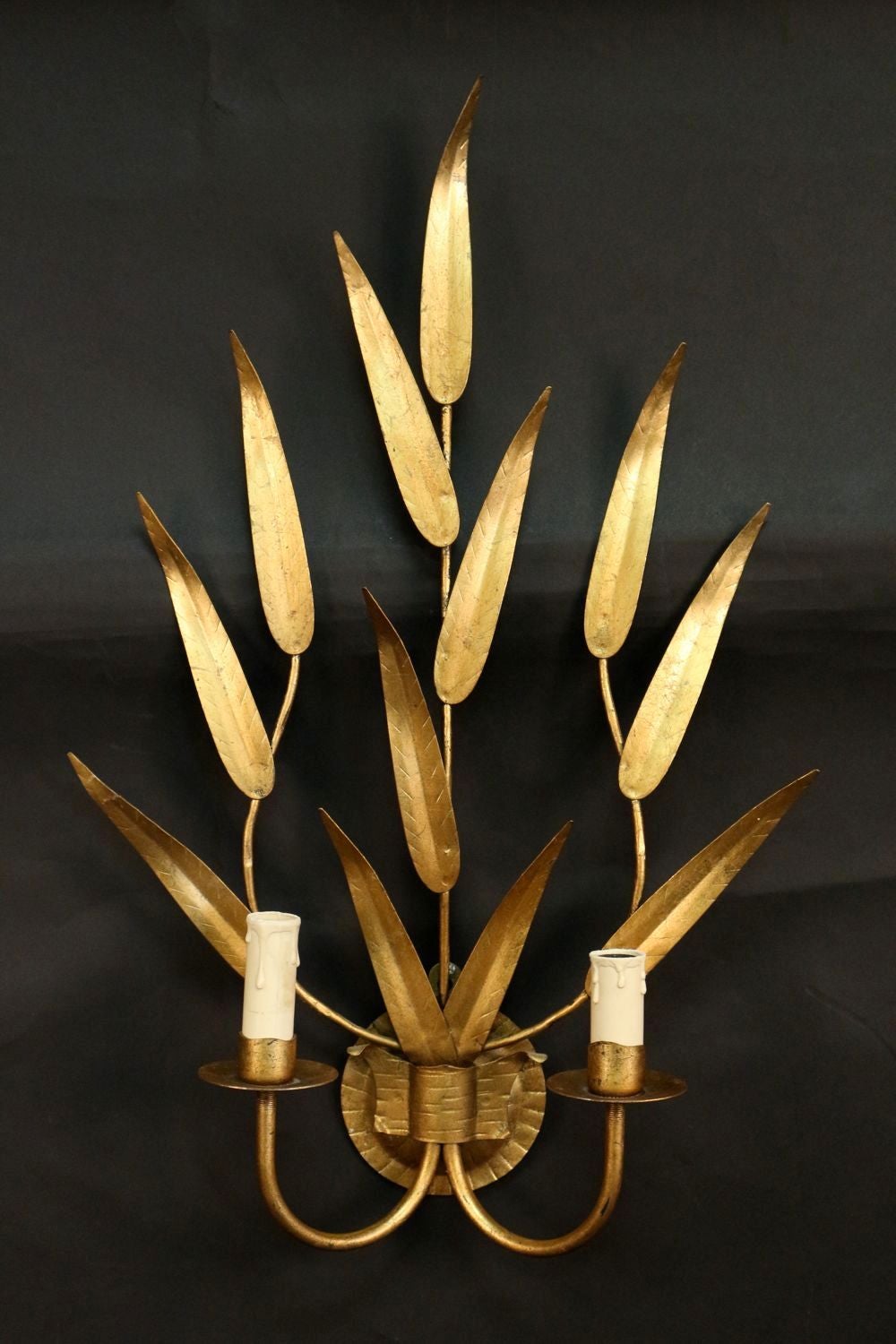 Pair of 1960's 'Foliage' sconces by Maison FlorArt composed of gilt iron foliage.                          Part of a series with item number LU98581856652. Two lighted arms per sconce.