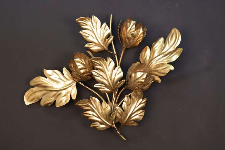 Pair of large 1960s flower brass sconces decorated with six large leaves. Three light sources covered by the leaves per sconce.