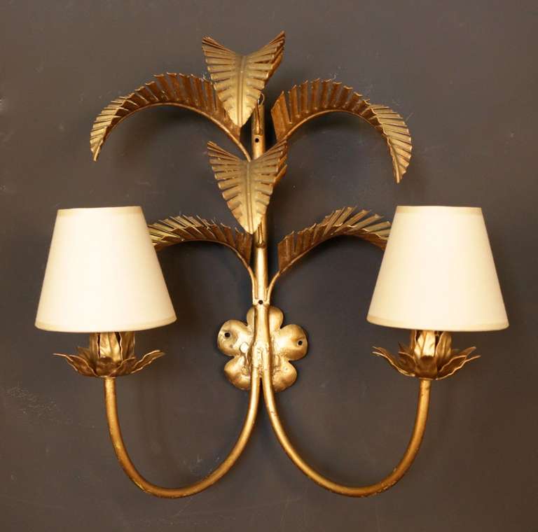 Pair of 1960's Palmtree flower sconces from The Lutetia Hotel Paris. Six branches and two lighted arms per sconce. The clipping shades have been redone according to the original.