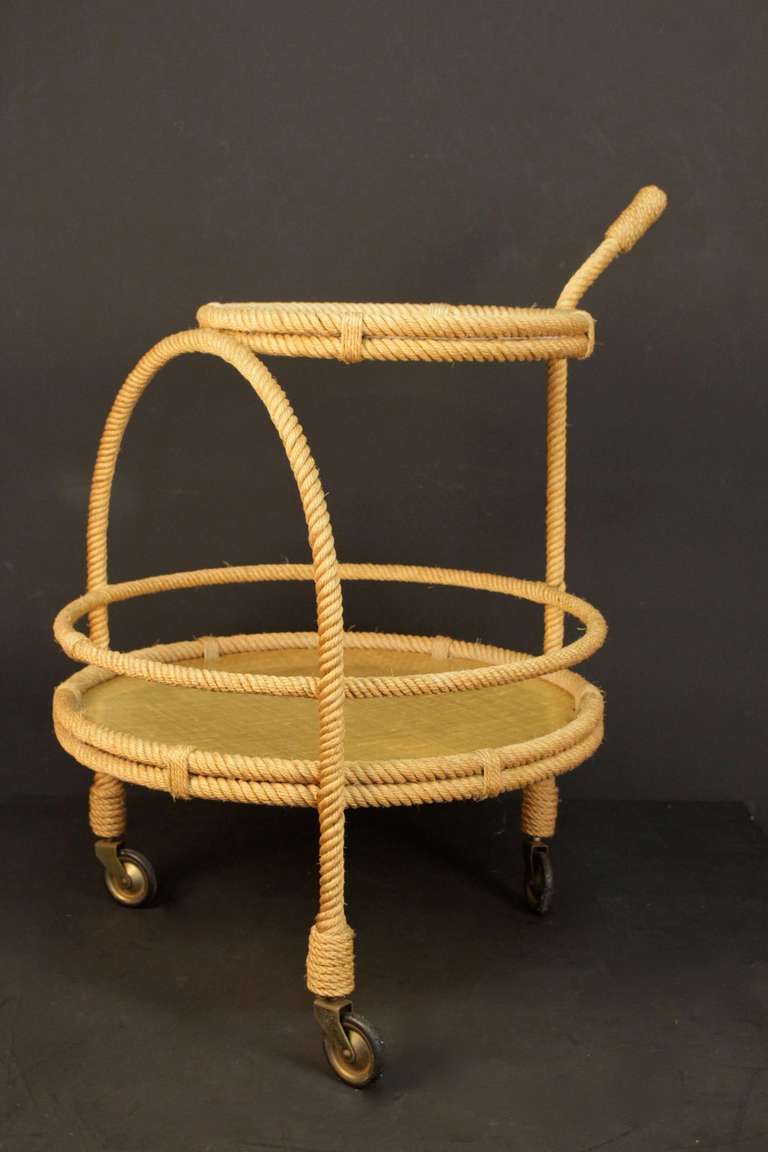 1950s table on wheels by Adrien Audoux Frida Minet. Rope with two round trays covered with a rope pattern 'formula.'