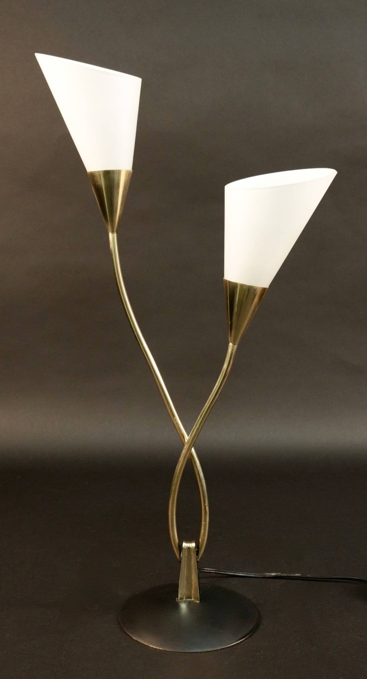Pair of 1950s Arum Lilly table lamp by Maison Arlus. 
Blackened bronze base. Interlaced gilt brass rods. 
Truncated cones opaline glass of white color and satin finish.