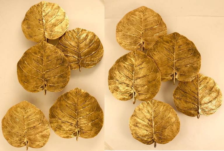 1978 signed wall plant composition by Chrystiane Charles. Ten Guadeloupe leaves. One sconces behind each leaf. To be nicely settled on a wall.

Two dimension models of Guadeloupean leaves:
- 4 leaves with 24cm diameter
- 6 leaves with 20cm