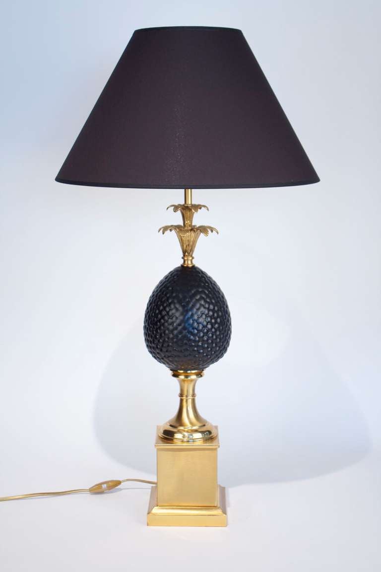 1970s Maison Charles pineapple table lamp. 
Bronze acanthus leaves, brass body, plaster pineapple, new shade. 
Good condition. normal wear consistent with age and use.