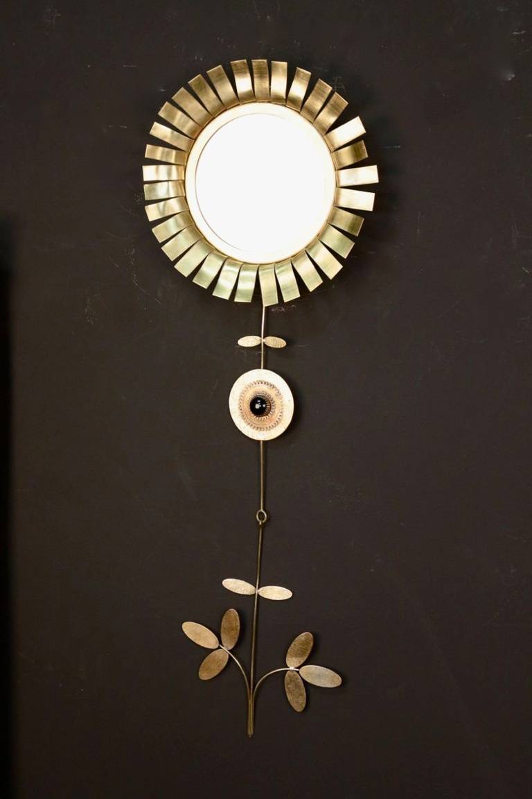1970s 'Daisy'Mirror' by Chaty Vallauris, enhanced with a moon jewel in black opaline and foliage.