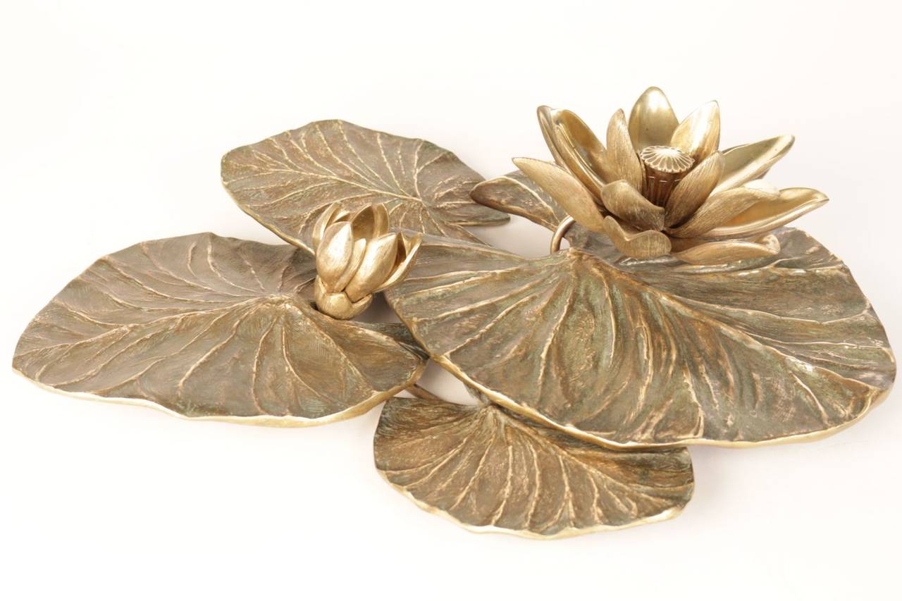 'Llily Pads' 1970s bronze table centrepiece by Charles Chrystiane for Maison Charles, consisting of four leaves and two flowers, one flower-bud, the second blooming, signed on the back of one leave.