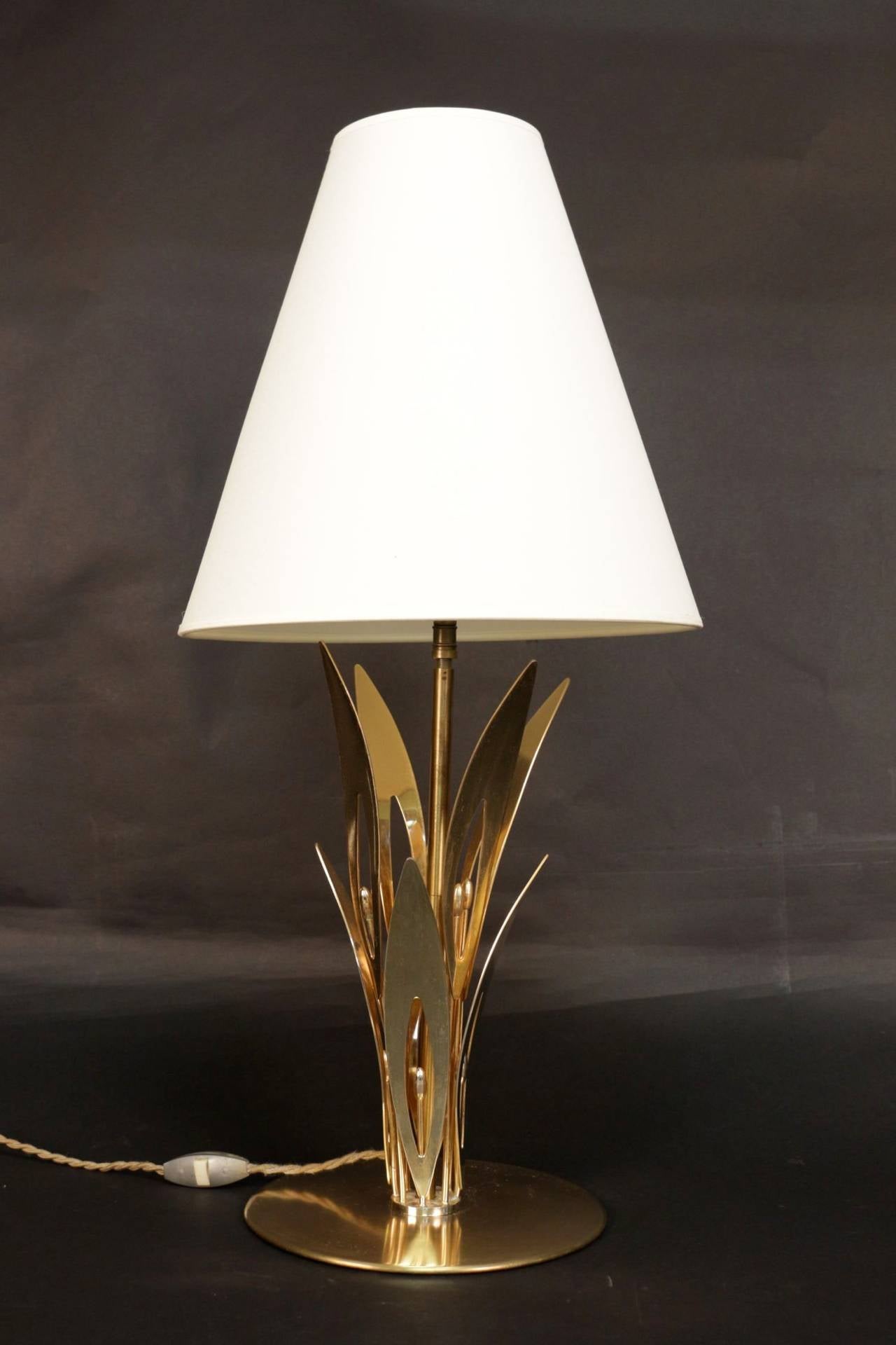 1960s 'Lily' brass table lamp decorated with lilies. One lighted arm. New lamp shade.