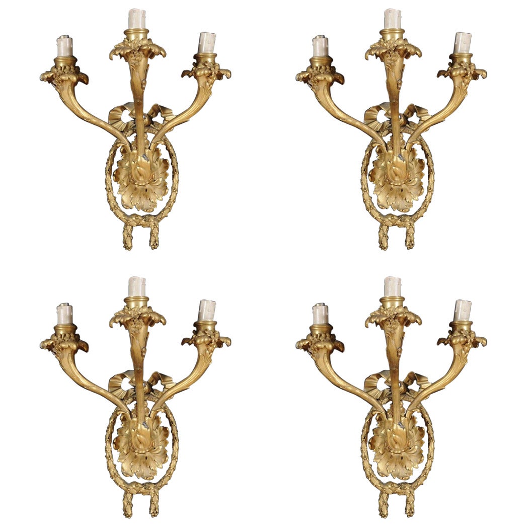 Four French 19th Century Gilt Bronze Three-Light Appliques