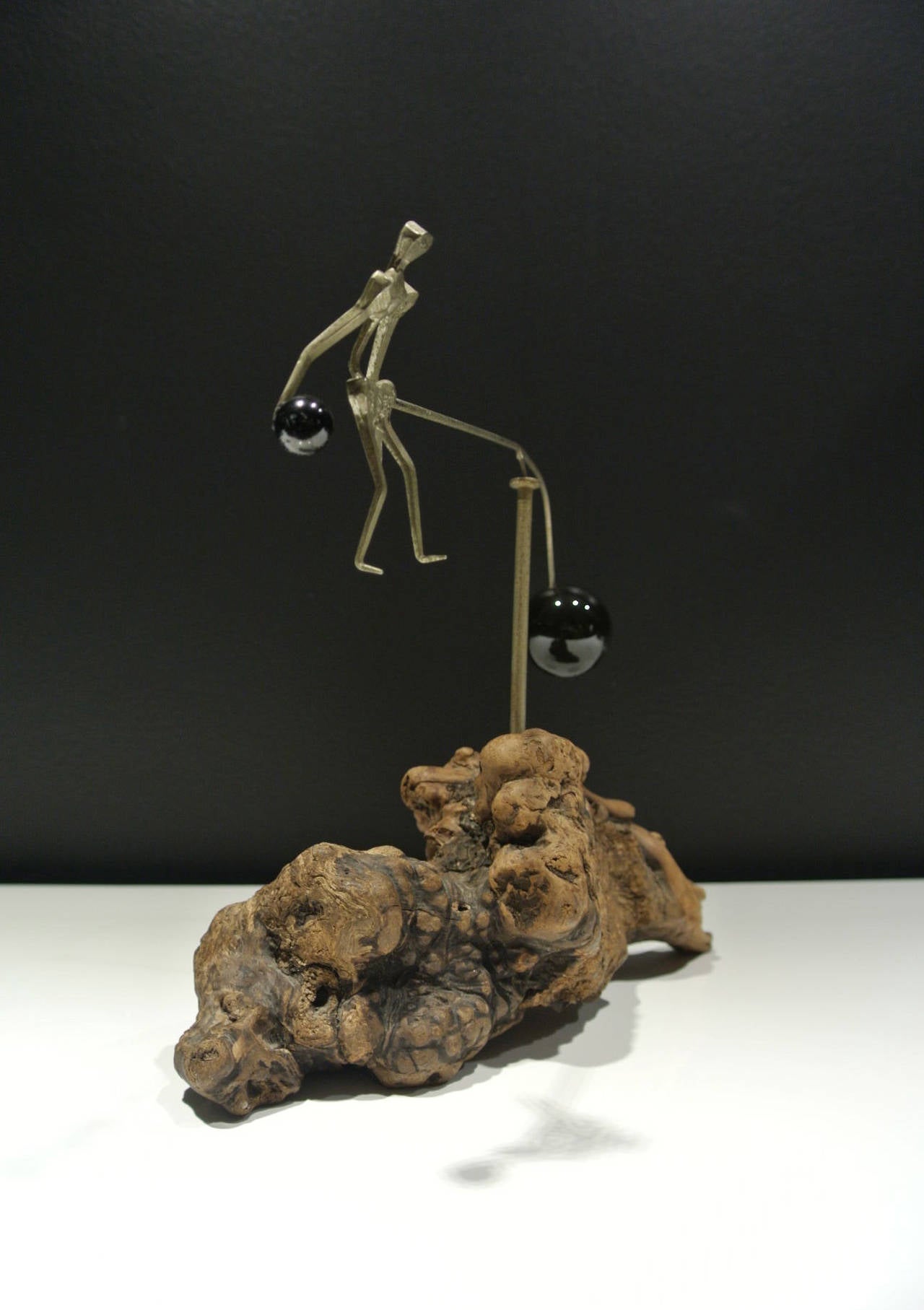 Mexican Bronze Swing Sculpture For Sale