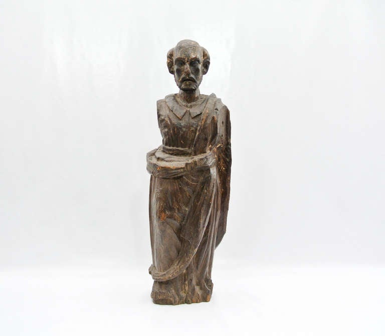 Antique Saint made with tropical wood with a secret hiding taxes compartment