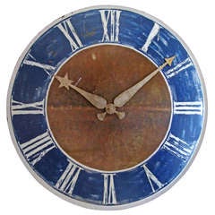 Oversize time clock in shaped and decorated metal sheet, France, late XIXe
