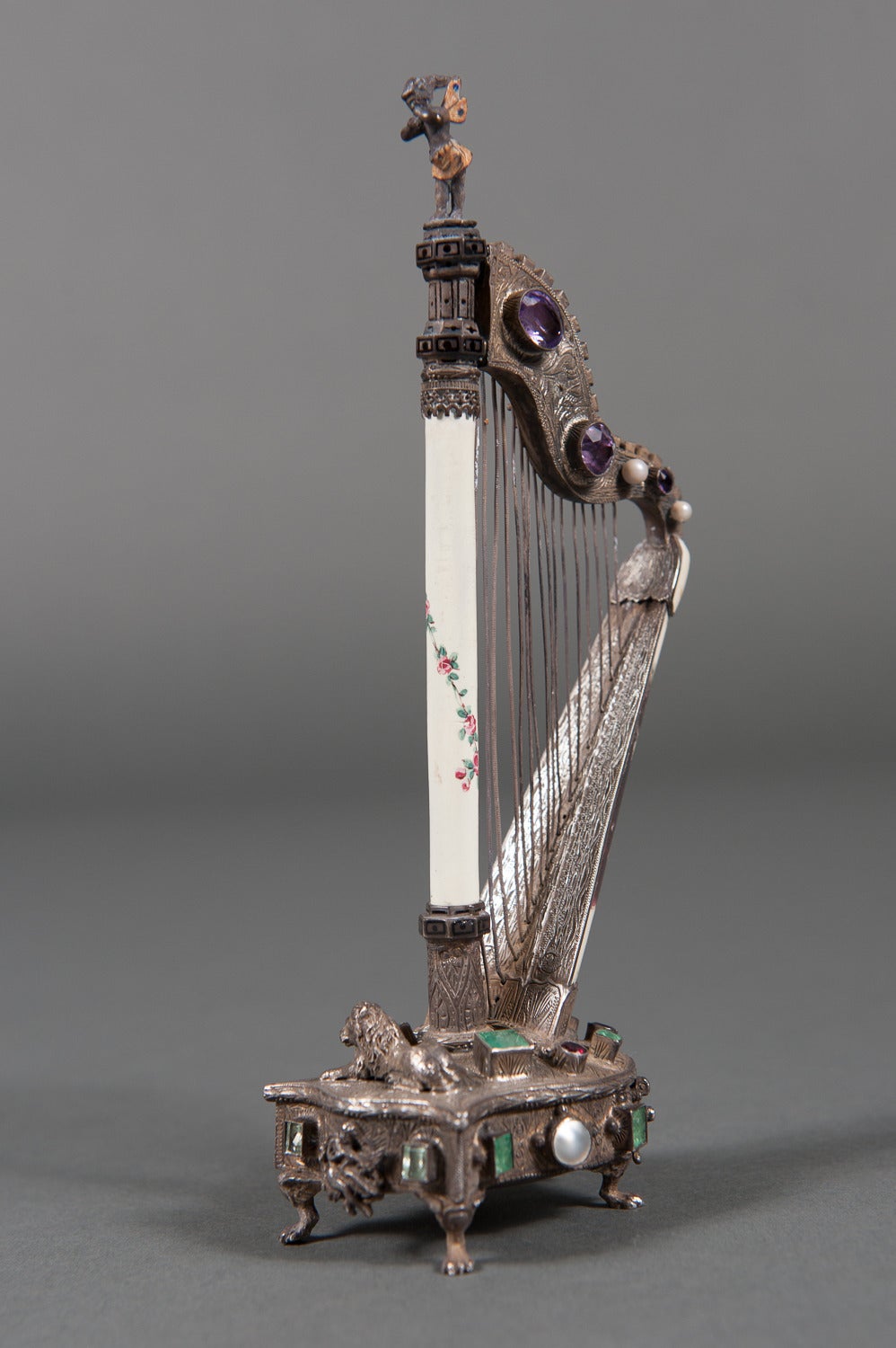 A Viennese Enamel and Jeweled Silver-Gilt Harp Form Small Timepiece, Hallmarked