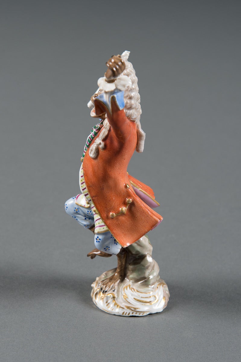 A 19th Century German Meissen Porcelain Figure of the Band Conductor 1