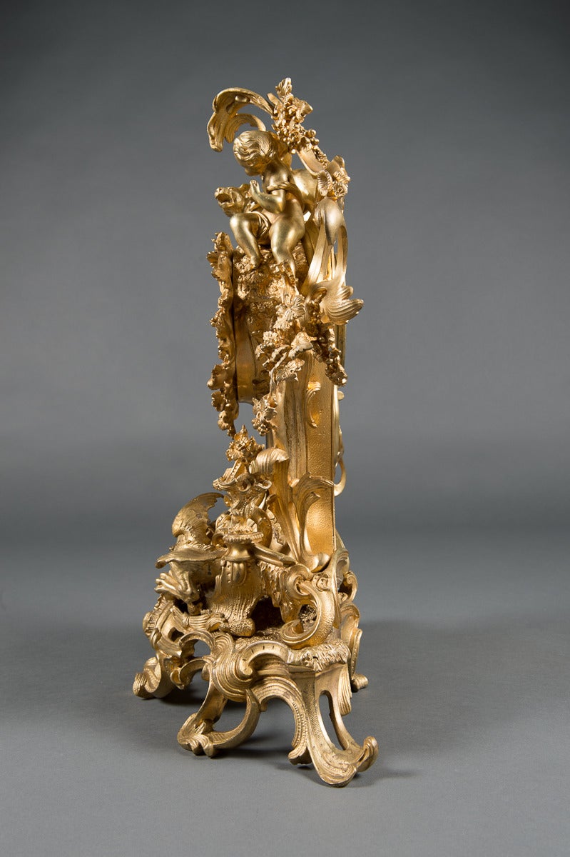 A French Gilt Bronze Figural Clock. In Good Condition In Los Angeles, CA