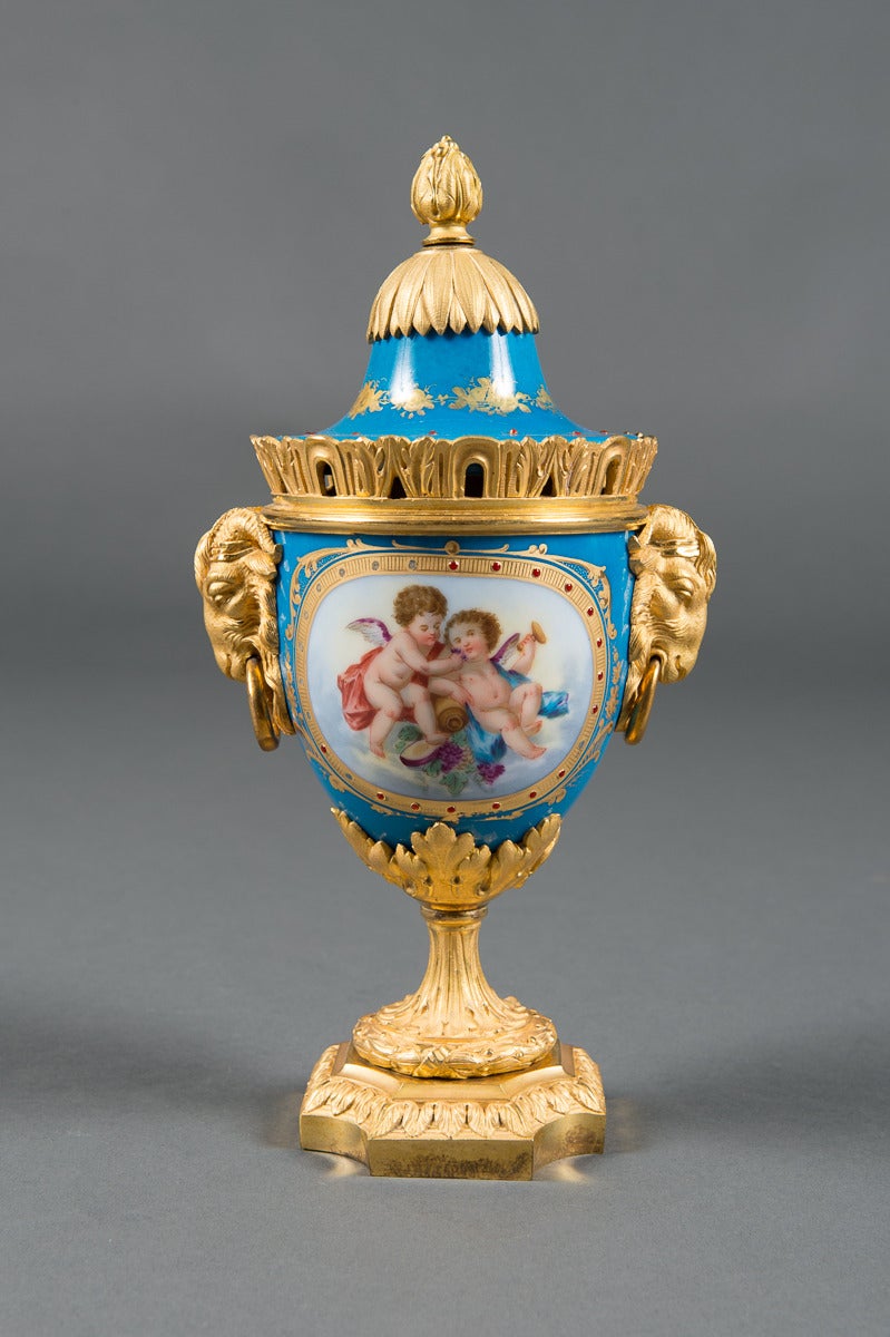 A Pair of 19th Century French Gilt Bronze Mounted Sevres Style Painted Vases In Excellent Condition In Los Angeles, CA