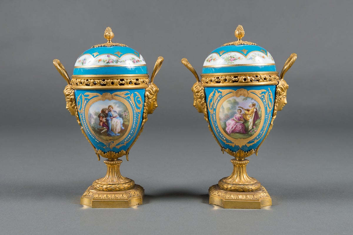 A Pair of 19th Century French Gilt Bronze Mounted Sevres Style Painted Vases

Circa 1880

Origin: France

Height: 11