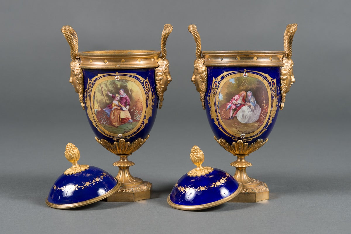 A Pair of 19th Century French Gilt Bronze & Cobalt Blue Sevres Style Jeweled Vases

Circa 1880

Origin: France

Height: 10