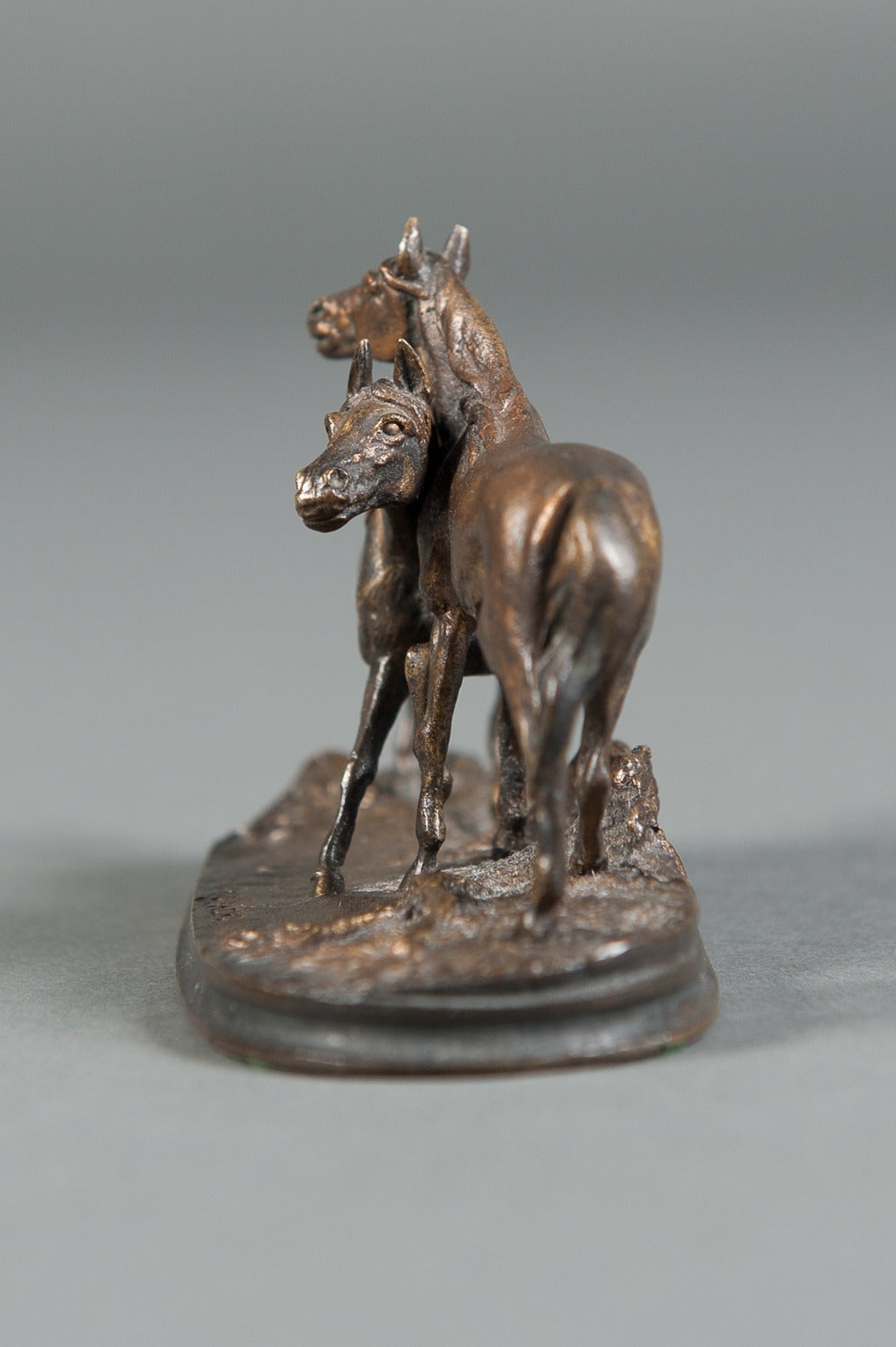 19th Century A French Patinated Miniature Bronze Figure of Two Horses by P.J. Mene