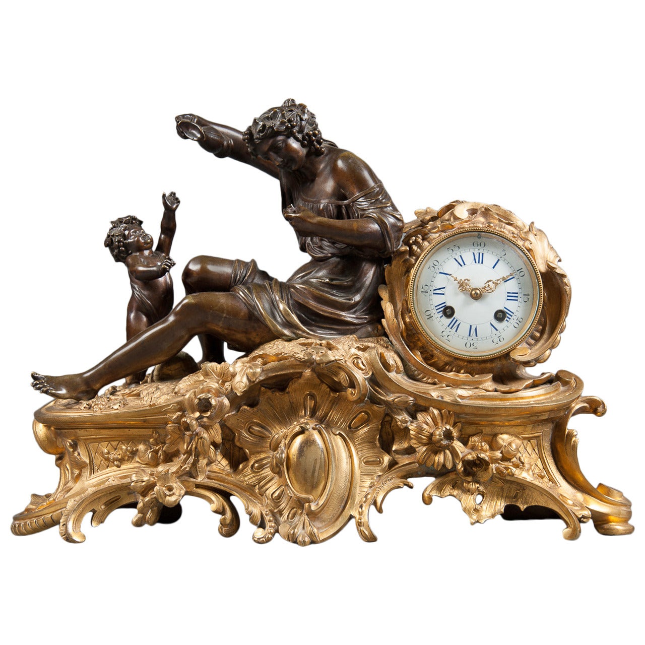 A Late 19th Century French Gilt and Patinated Bronze Figural Mantle Clock