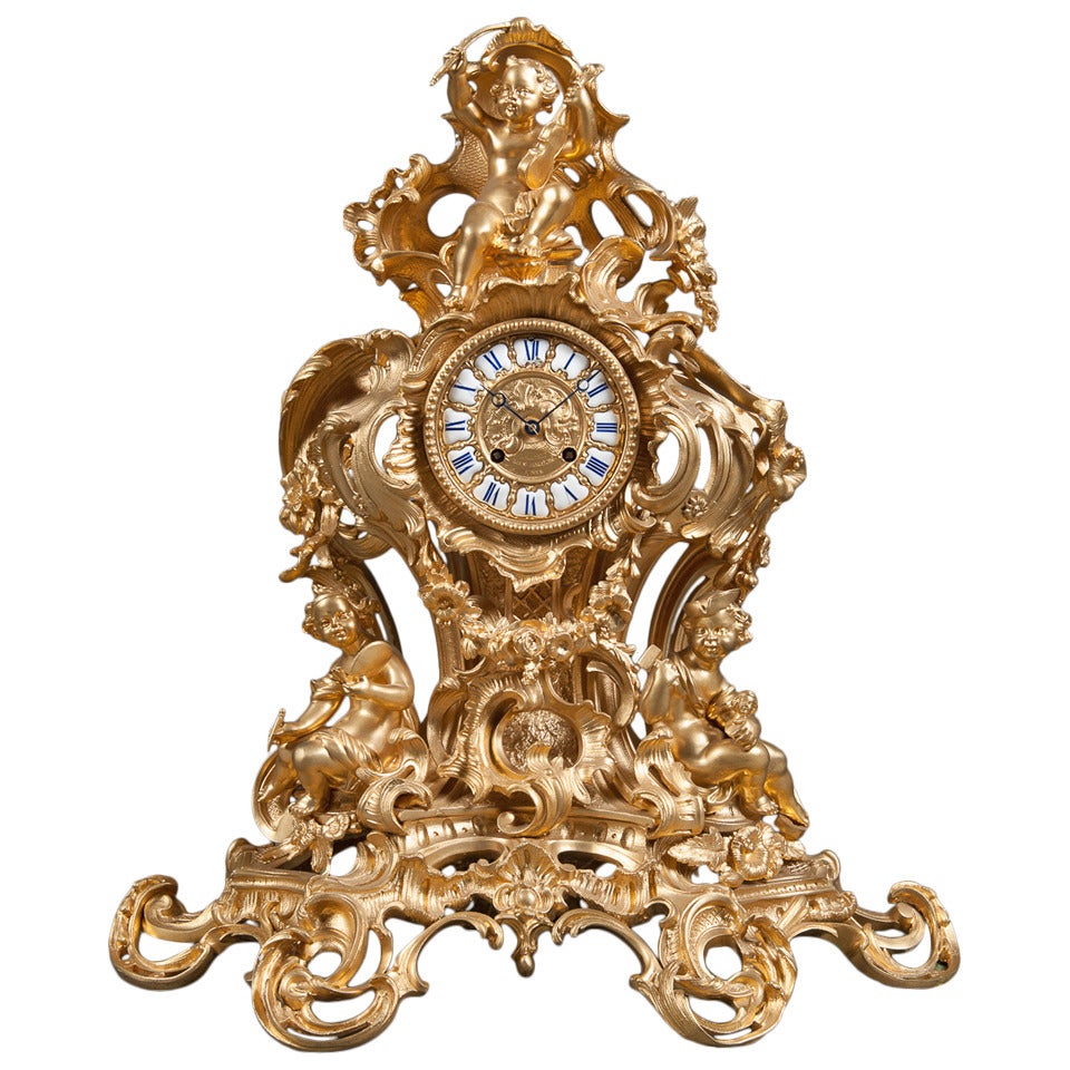 A 19th Century French Gilt Bronze Figural Mantle Clock