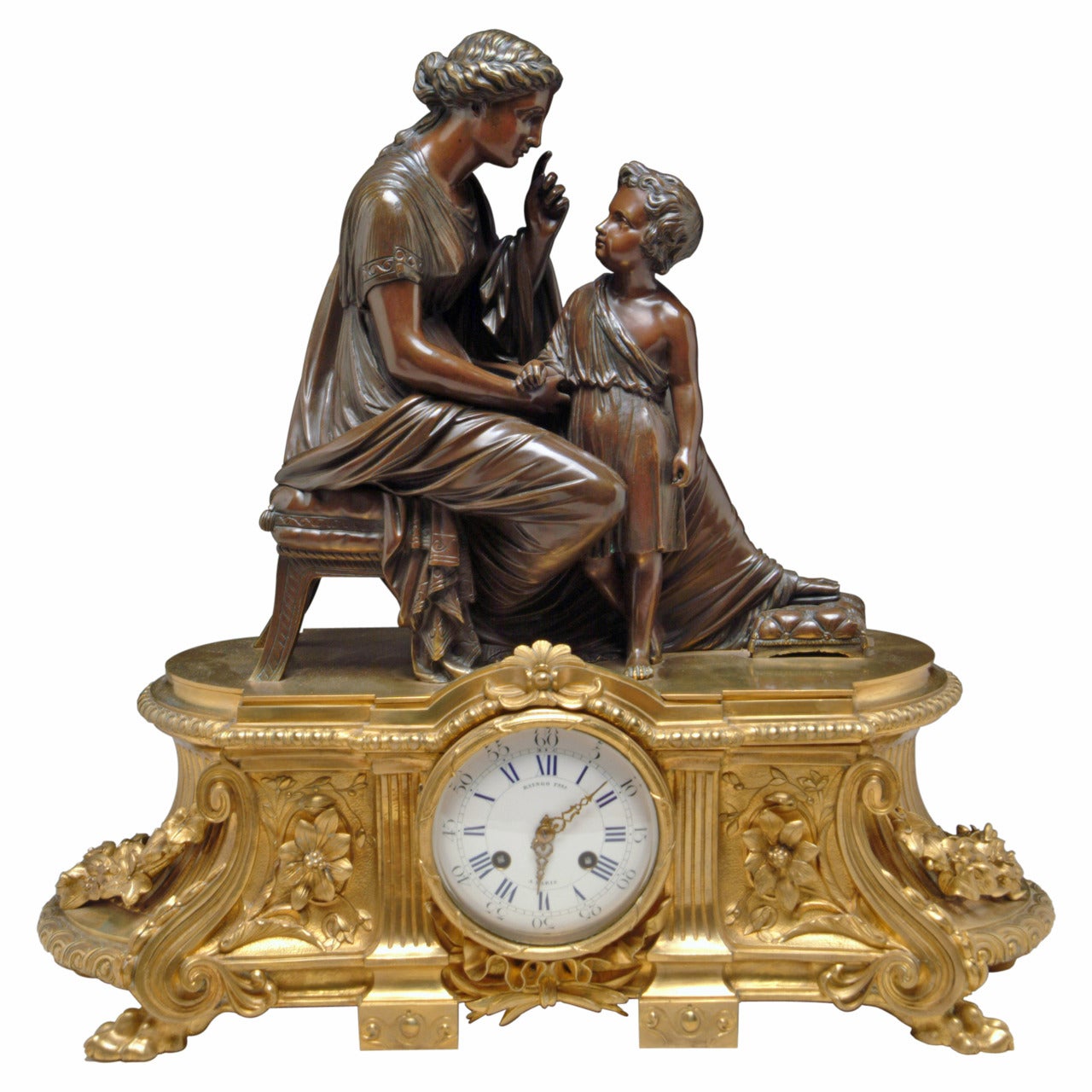 A 19th Century French Gilt & Patinated Bronze Figural Mantel Clock by Raingo For Sale