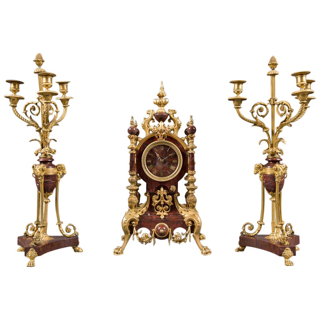 A 19th Century French Rouge Marble & Gilt Bronze 3-Piece Clock Garniture