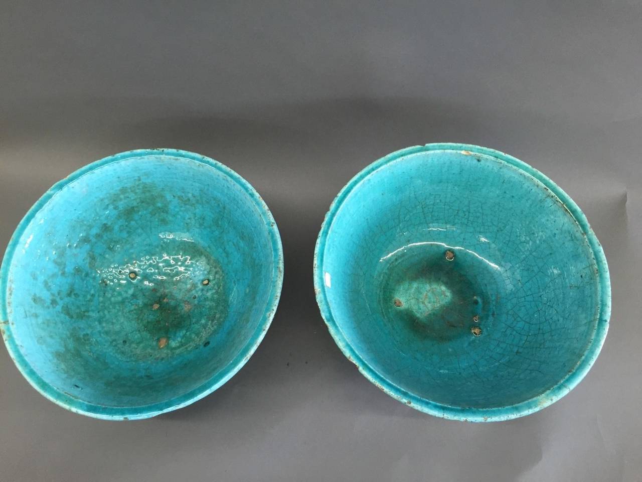A Pair of Persian Ceramic Turquoise Handcrafted Bowls

They are a about 1/2
