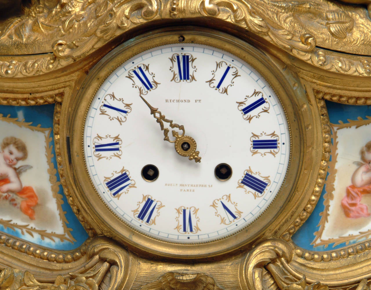 19th Century French Gilt Bronze and Sevres Style Porcelain Figural Clock Depicting Lovers