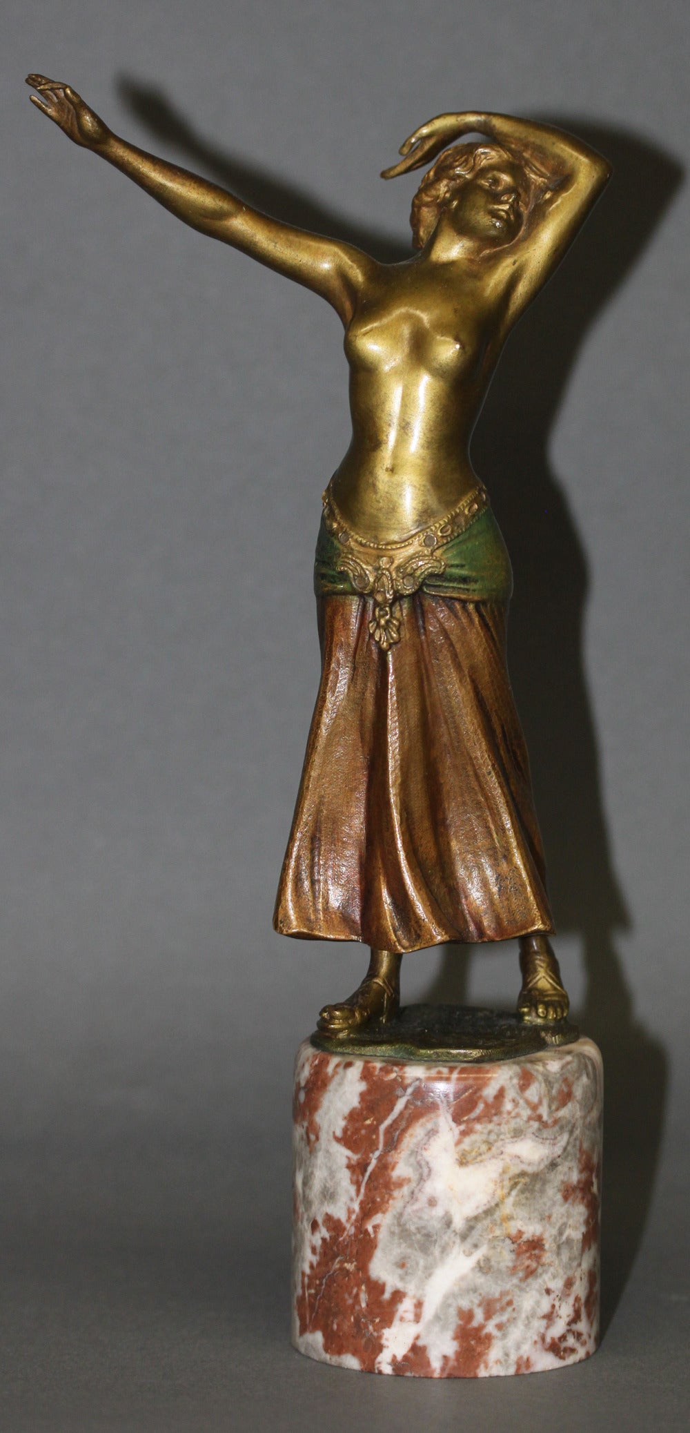 A cold painted Austrian bronze of semi nude dancer on a marble base. 

Signed Fitz, made in Austria.

Austria, circa 1910.

Excellent condition.

Dimensions: Height: 8