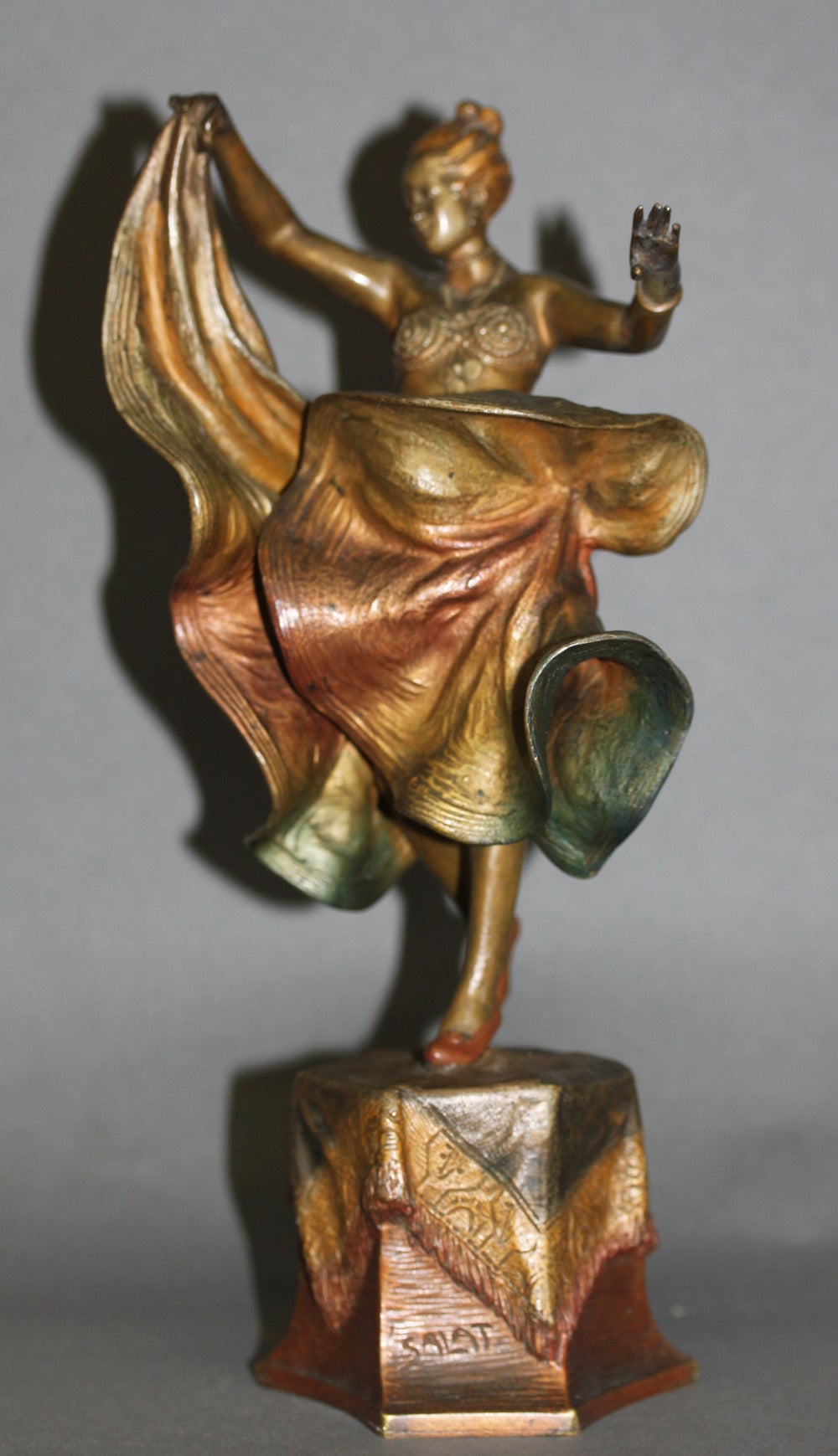 A mechanical Vienna bronze cold painted figure of an exotic dancer by Bruno Zach. 

Her dress opens into a nude dancer. 

Signed. Salat (Austrian pseudonym for Bruno Zach 1891-1945), 

Austria, circa 1910.

Excellent