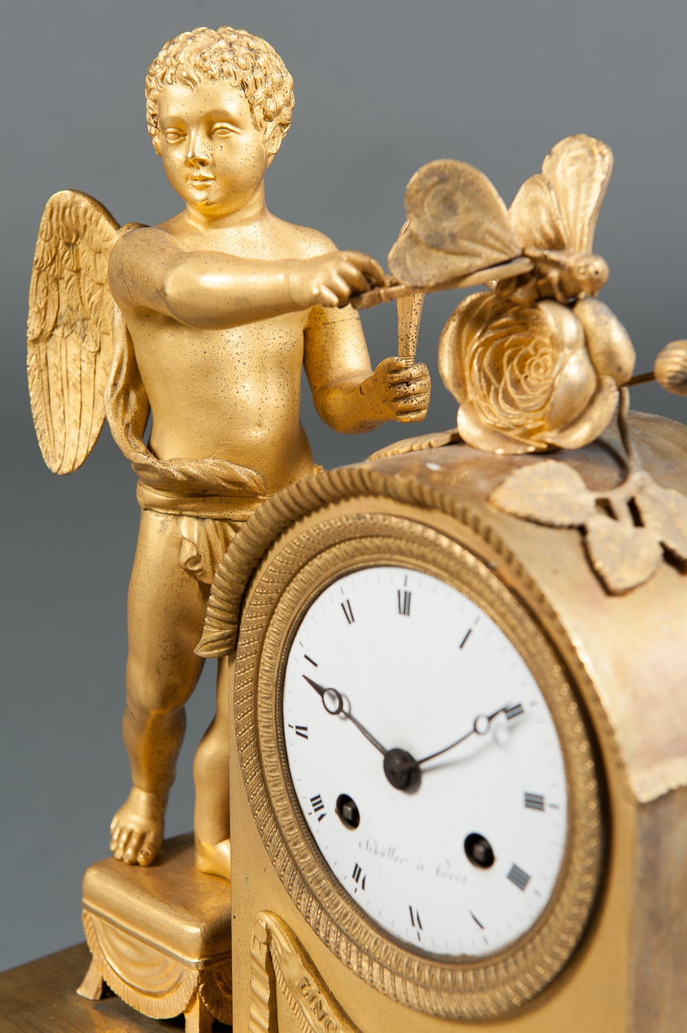 An Early 1800's Gilt Bronze Mantle Cock of a Cherub & Butterfly 1