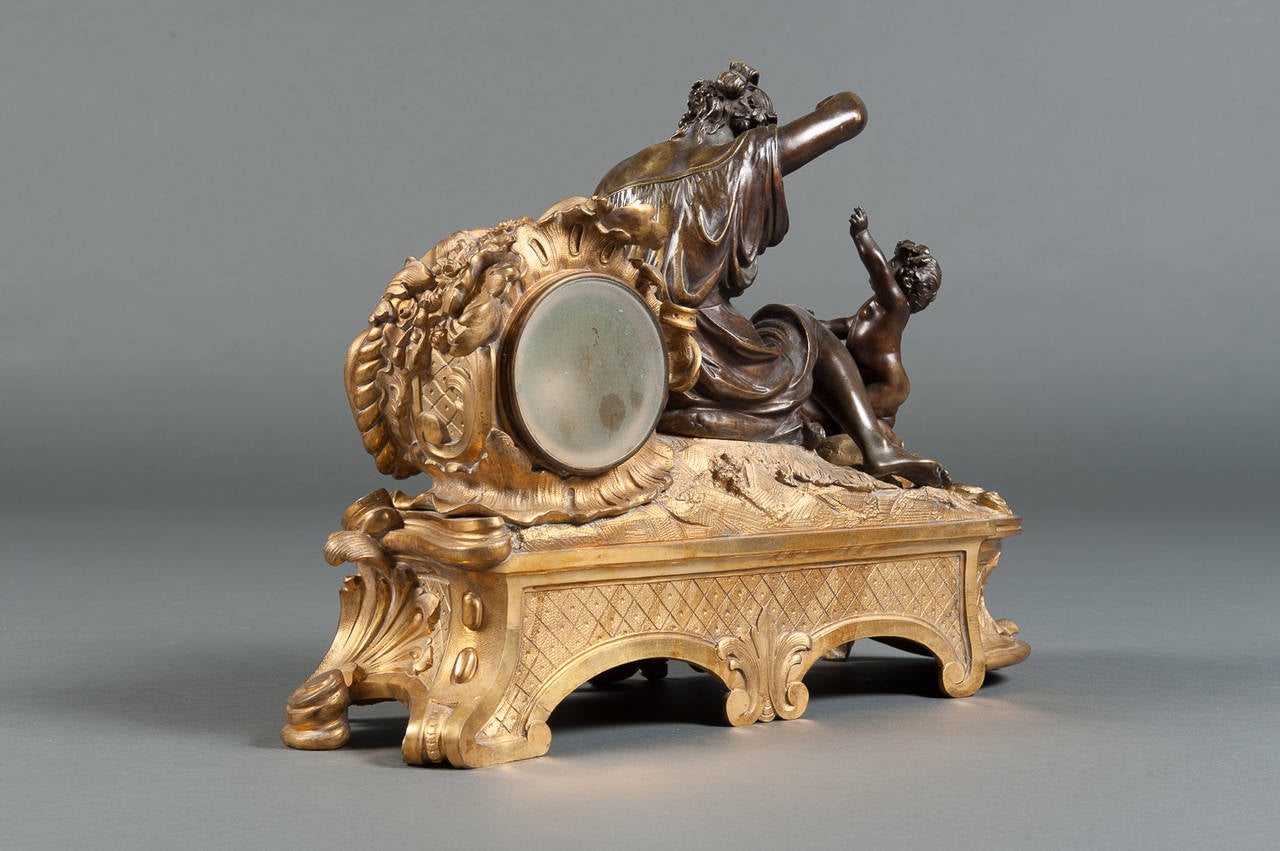 A Late 19th Century French Gilt and Patinated Bronze Figural Mantle Clock In Excellent Condition In Los Angeles, CA