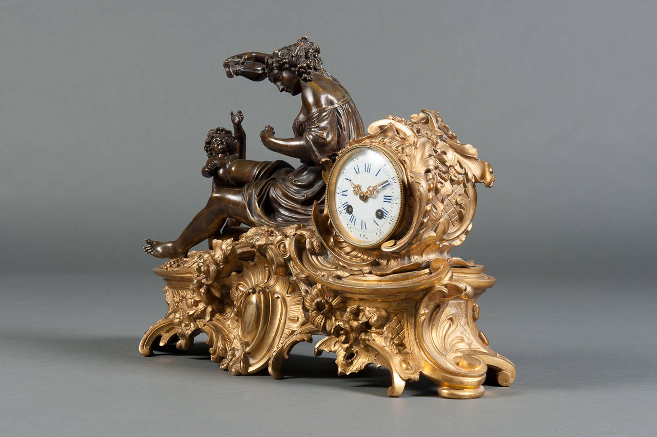 A Late 19th Century French Gilt and Patinated Bronze Figural Mantle Clock 2