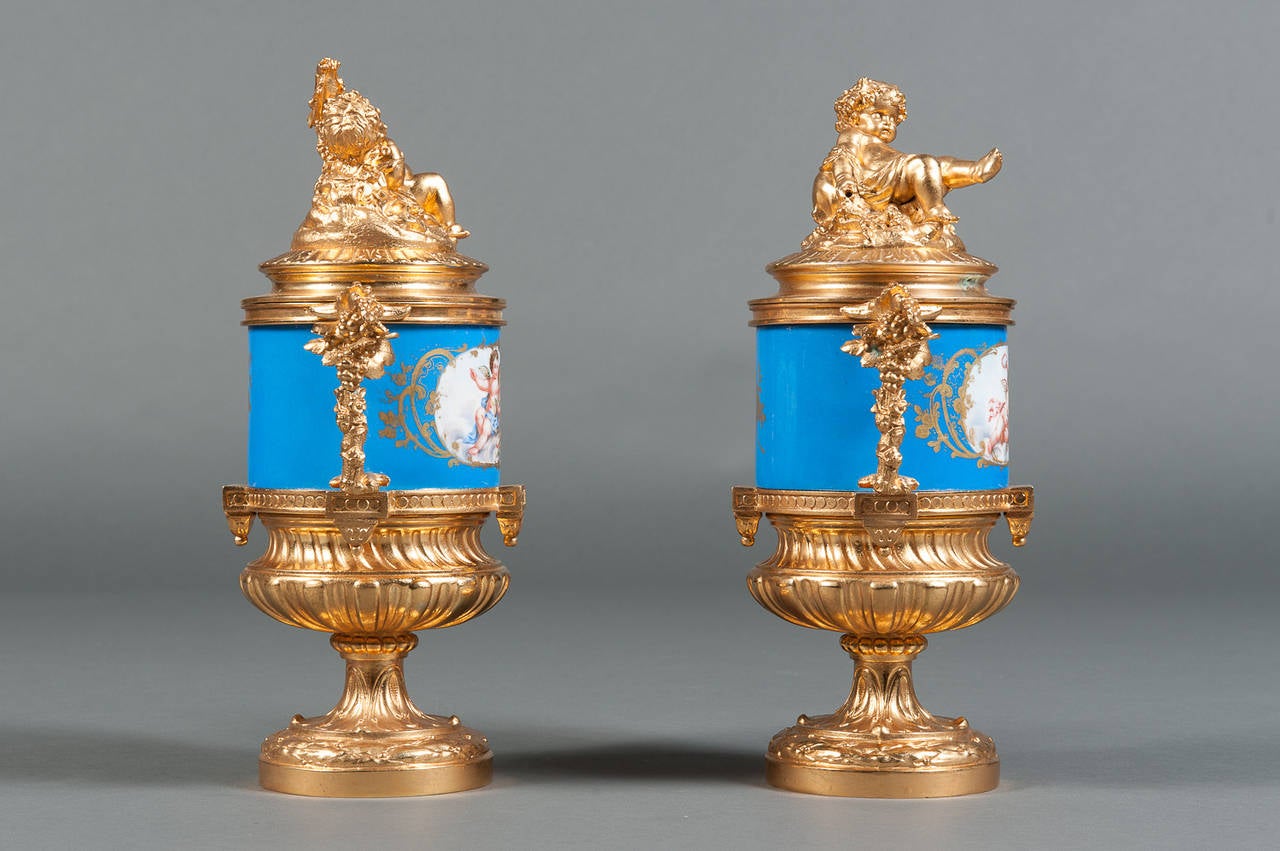 A Pair of 19th Century French Sevres Style & Gilt Bronze Porcelain Lidded Vases In Excellent Condition In Los Angeles, CA