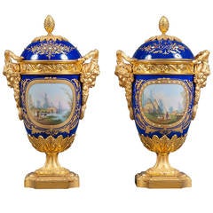 A Pair of French Gilt Bronze Mounted & Cobalt Blue Sevres Style Lidded Vases
