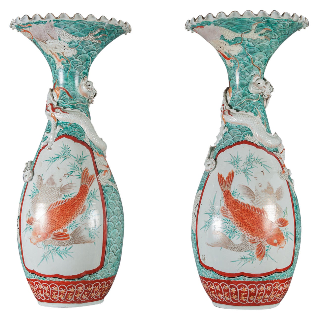 A Pair of Antique Japanese Porcelain Vases with Dragon Motif For Sale