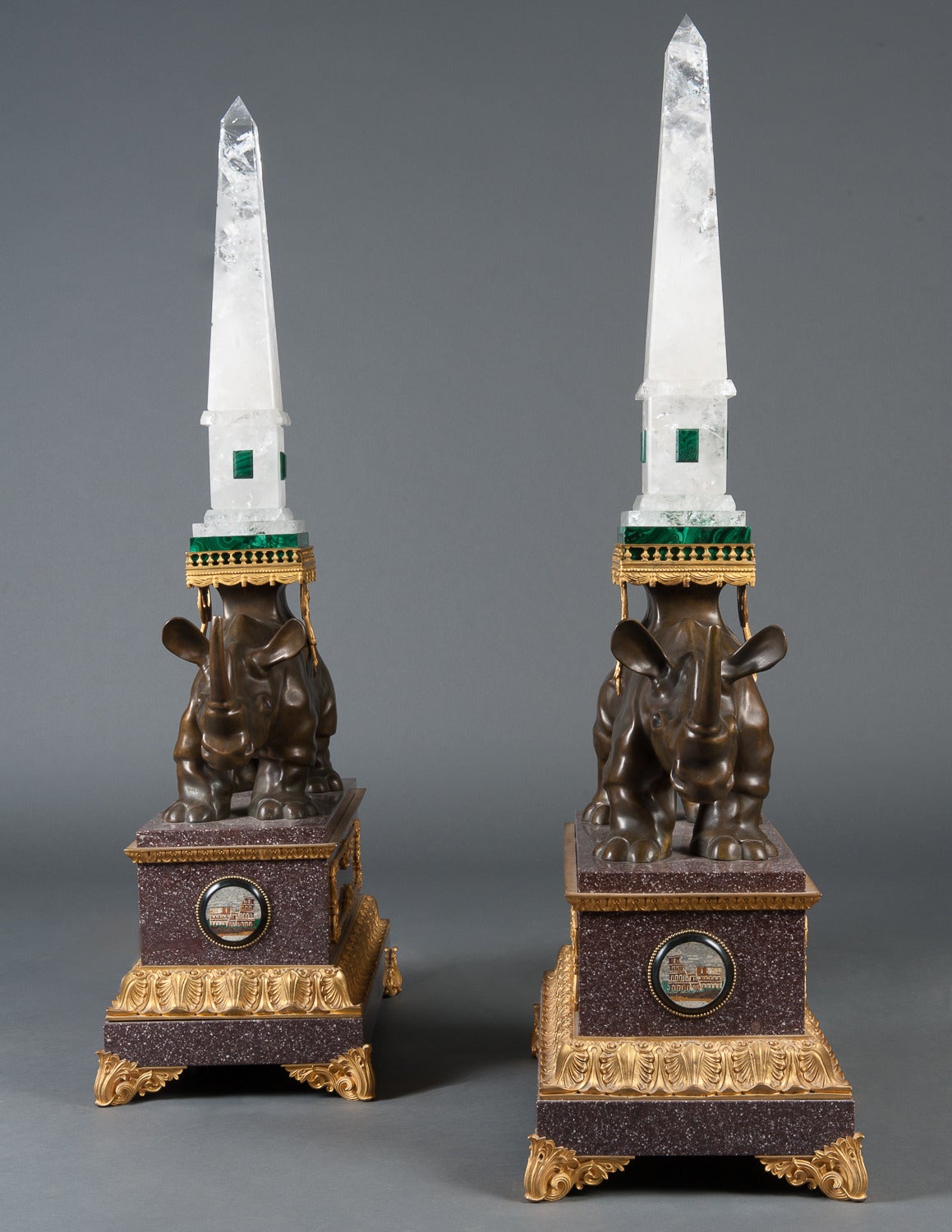 20th Century A Pair of Louis XVI Style Bronze Rhinoceros Figures with Rock Crystal Obelisks For Sale