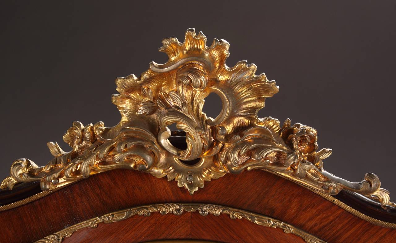 circa 1870.
 
Origin: Paris.
 
Height: 71″.
Width: 33.5″.
Depth: 19″.
 
Style: Louis XV.
 
Maker: Unknown.
 
The shaped top over a serpentine glazed door on cabriolet legs with bronze sabots.