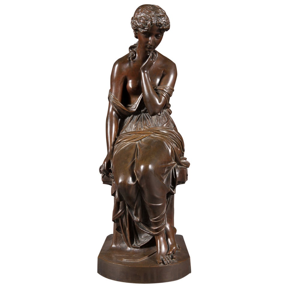 Sculpture française du 19ème siècle en bronze patiné d'une femme tenant une fleur de lys