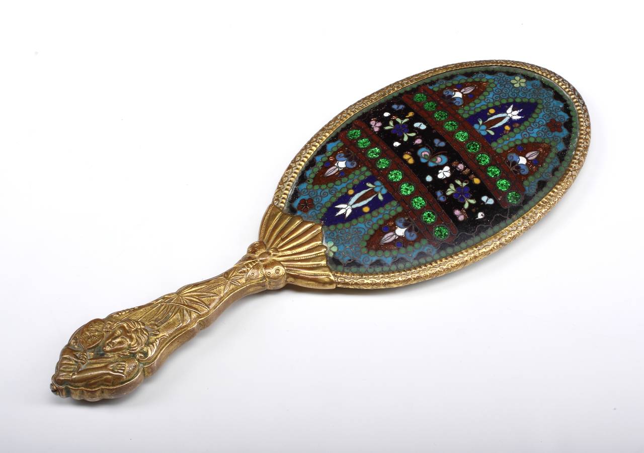 A Cloisonné Hand Mirror

Age: Unknown

Origin: Unknown

Depth: 3.5