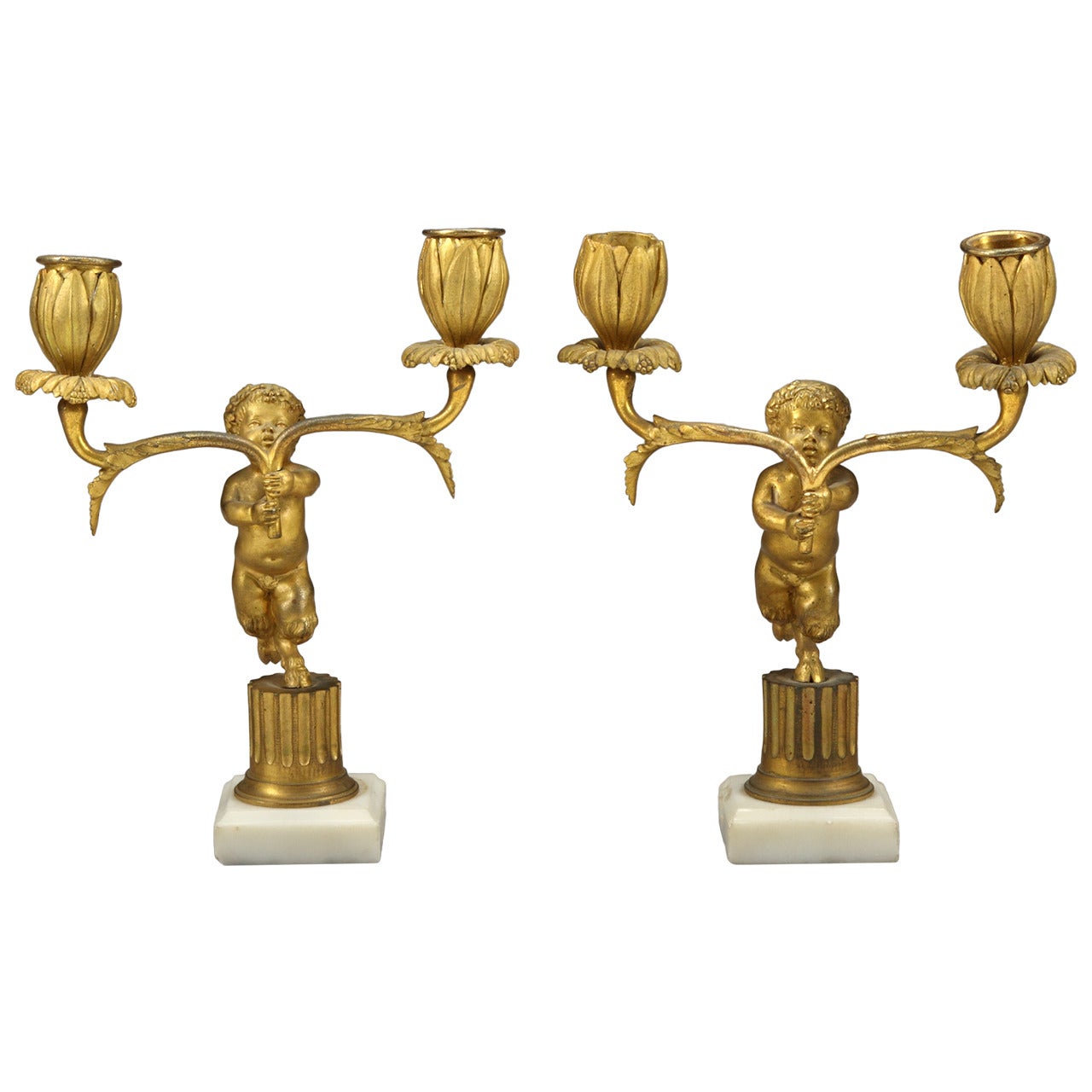 A Pair of French Antique Bronze & White Marble Figurative Candle Holders