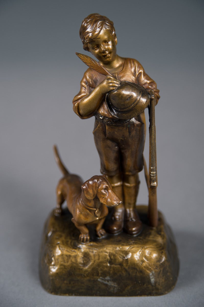 An Antique Austrian Bronze Figure of a Boy with His Dog and a Rifle

Circa 1900 

Origin: Austria

Height: 6 1/4