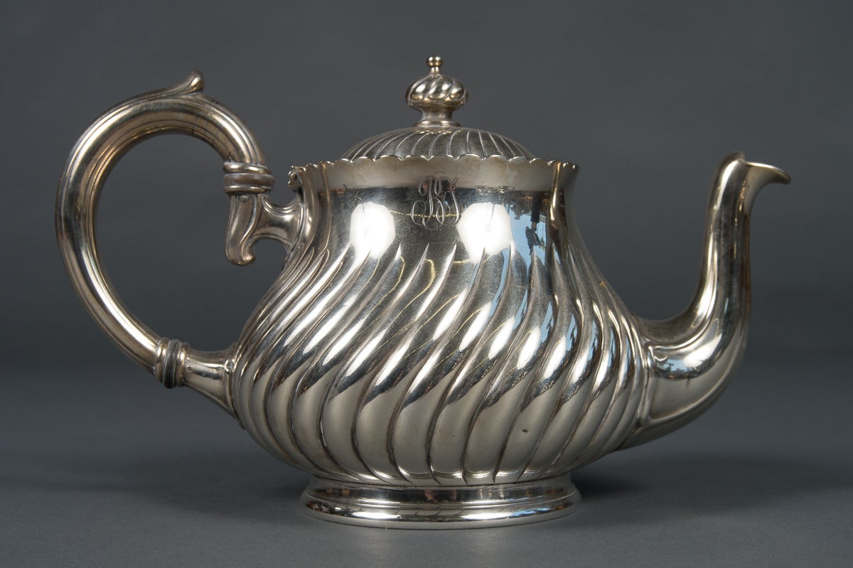 An Antique 4-Piece Silver Plated Tea Set by Christofle

Period: Post 1900

Origin: France

Large Pitcher
Height: 8