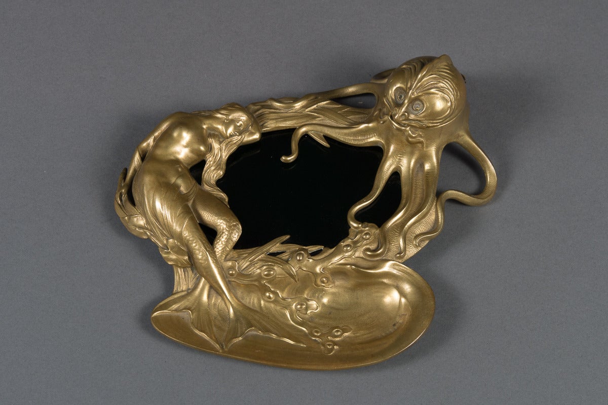 An Antique Viennese Bronze Inkwell with Mermaid & Octopus Design Marked Geschutzt

Circa 1900 

Origin: Austria

Height: 3