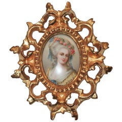 A Berlin Hand Painted Plaque Depicting Marie Antoinette in a Gilt Wood Frame