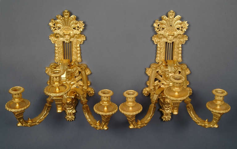 A Pair of French Antique Gilt Bronze Three-Light Wall Sconces With Figural Heads

Circa 1950

Origin: France

Depth: 12