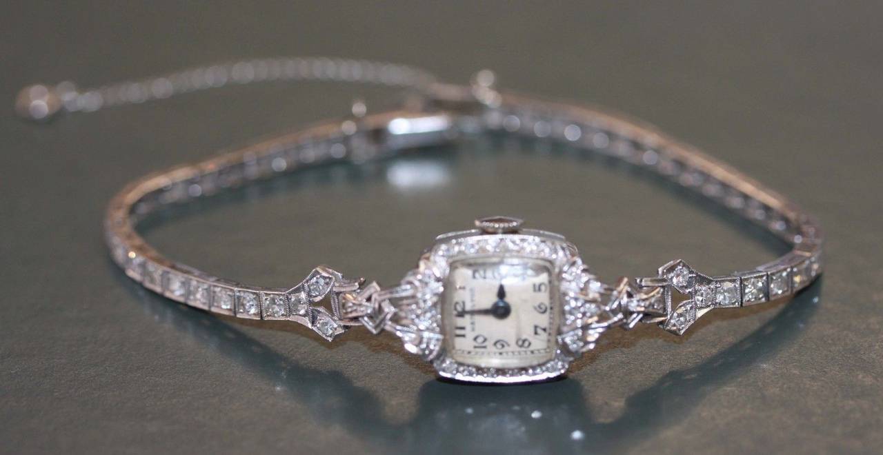 14-karat white gold platinum and diamonds Swiss Hamilton vintage ladies wrist watch working,

Swiss, circa 1930s.

Metal: Platinum white gold.

Marked Hamilton on the back of the watch.

Marked 14k on the watches clip (see picture).

The