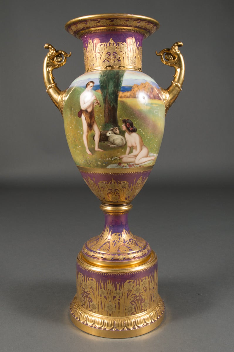 A Fine & Large Austrian Antique Royal Vienna Iridescent Painted Vase. The front finely painted with two maidens bathing next to a river. The rear painted with semi nude man playing a flute to his lovely nude maiden under a tree with lambs. The