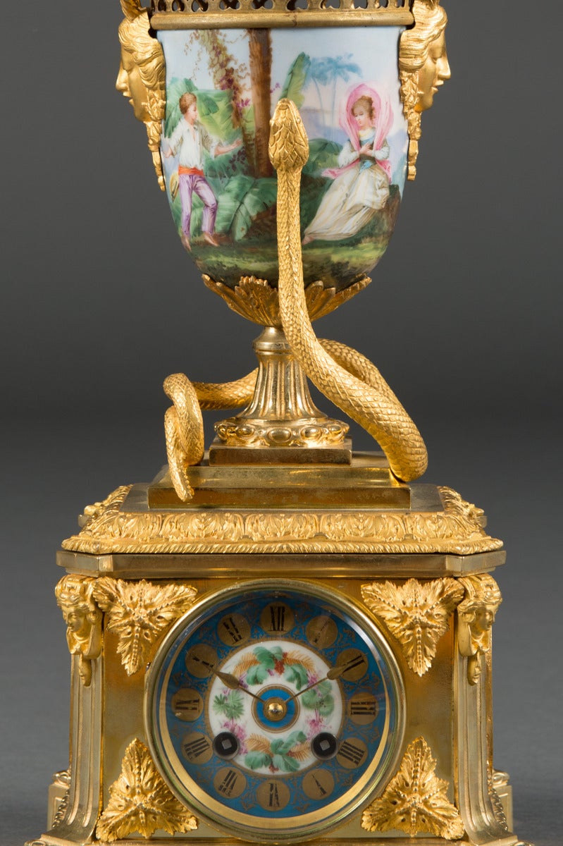 A French Antique Gilt Bronze & Porcelain 3-Piece Clock Garniture  1